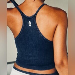 NWOT FREE PEOPLE Movement HAPPINESS RUNS LONG CROP TANK